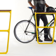Illustration for article titled All Bike Racks Should Have a Neat Storage Shelf Like This